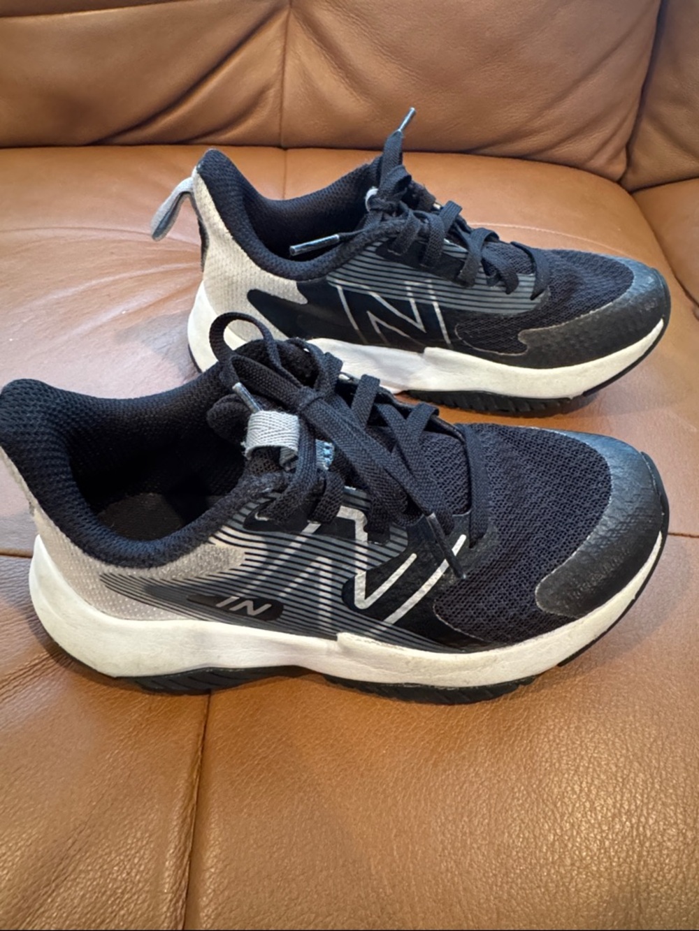 New Balance Kids Black and White Sneakers